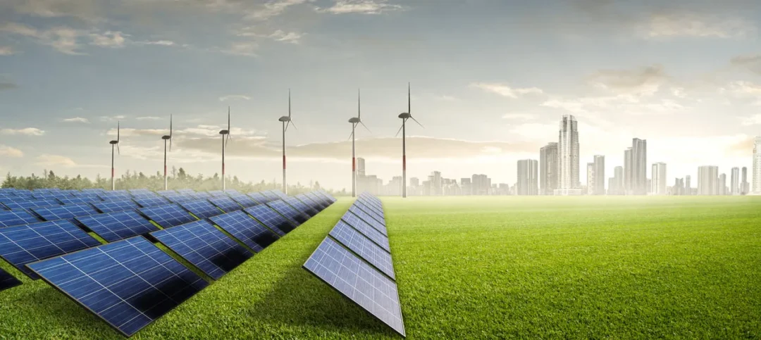 A landscape featuring solar panels in the foreground and wind turbines beside a modern city skyline under a bright sky.